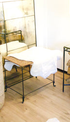 Aged Iron Stool with Sheepskin